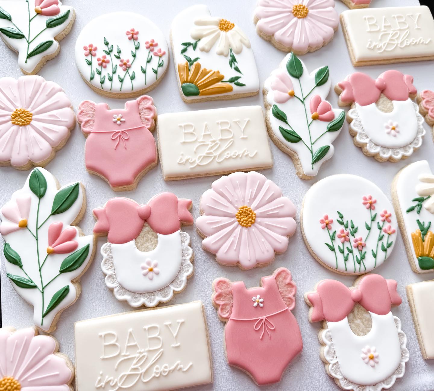 Custom decorated baby shower sugar cookies in pink florals