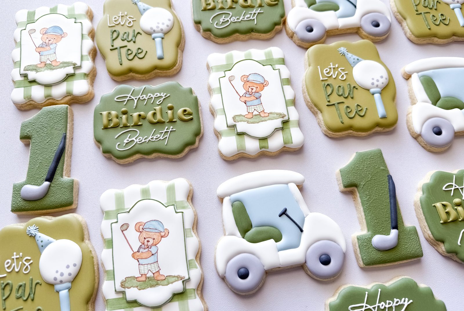 Let's Par-Tee golf first birthday cookies with hand-painted teddy bear golfer, golf carts, and plaid